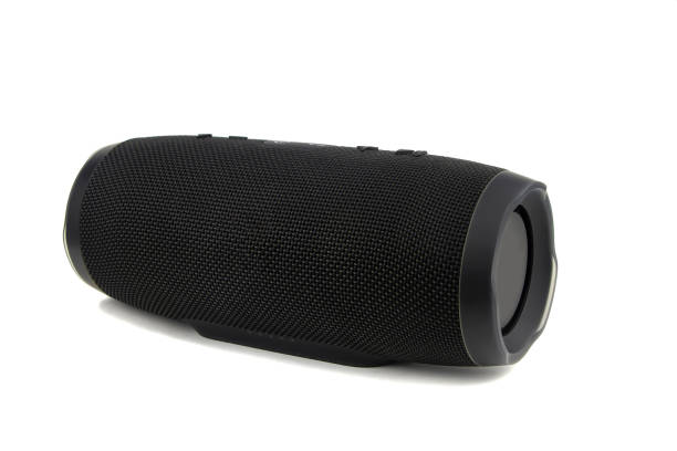 Black portable acoustics on a white background. Black portable acoustics on a white background. Isolated. bluetooth stock pictures, royalty-free photos & images
