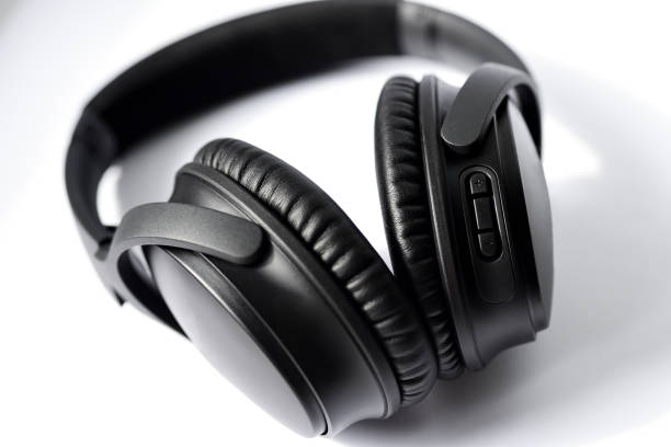 black professional headphones on white background - mobile phone imagens e fotografias de stock