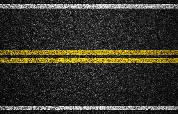 Black road graphic with yellow central marking and white Asphalt highway with road markings background dividing line road marking photos stock pictures, royalty-free photos & images
