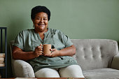istock Black Senior Woman Enjoying Coffee 1359105322