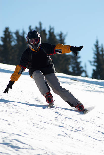 Black skier in helmet stock photo