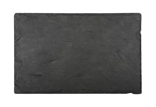 Black slate board isolated on white Close up of rectangle shape big black slate stone cutting board isolated on white background film slate photos stock pictures, royalty-free photos & images