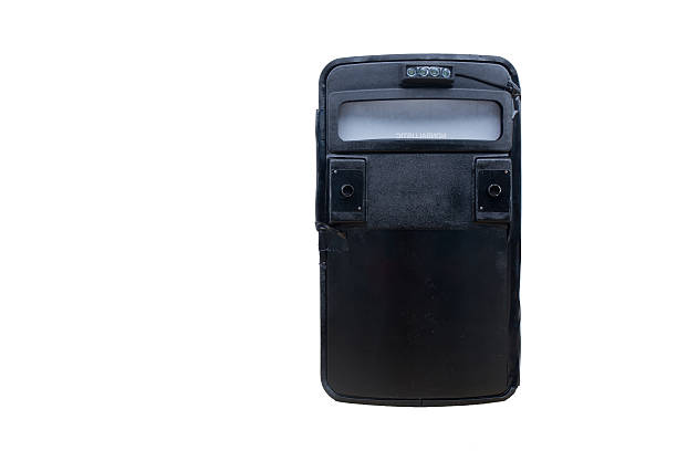 black tactical ballistic shield with flash light isolated on whi stock photo