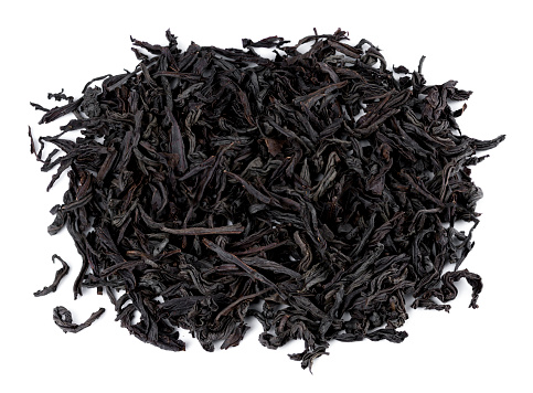 Black tea on a white background