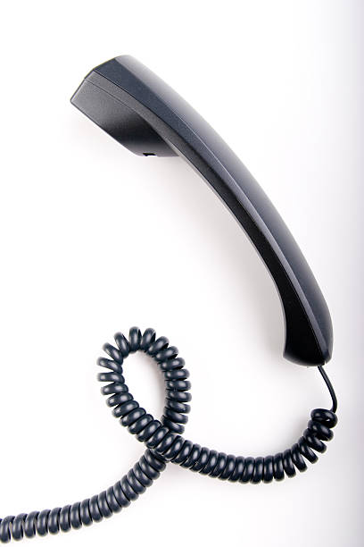 Black telephone handset stock photo
