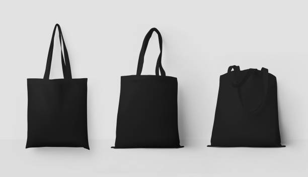 Black totebag 3d rendering mockup with handles, isolated on background, ecological sack set for retail. stock photo