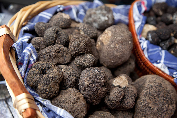 baskets with black truffles at a local market in Italy - Health benefits of truffles