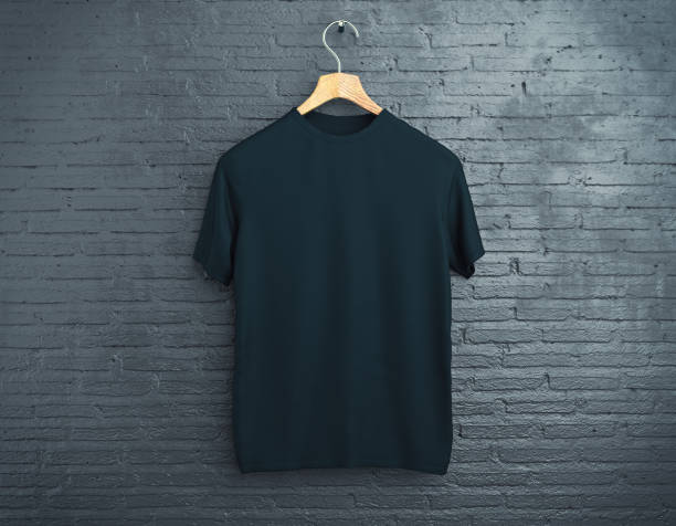 Black t-shirt on brick background Wooden hanger with empty black t-shirt hanging on dark brick background. Retail concept. Mock up. 3D Rendering blank t shirt stock pictures, royalty-free photos & images