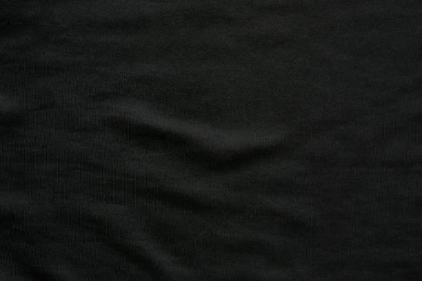 black wavy fabric background stock photo