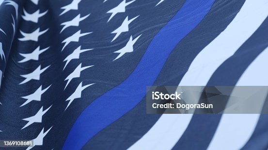 istock Black white american monochrome flag with blue stripe or line, police support. 1369108681
