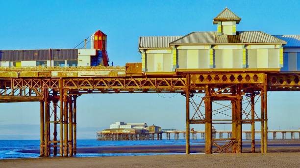 Blackpool Piers Blackpool Piers and beach is north pier stock pictures, royalty-free photos & images