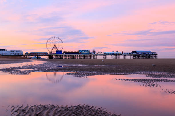 Blackpool Sunrise A beautiful Blackpool Sunrise on the west coast of the UK blackpool tower stock pictures, royalty-free photos & images
