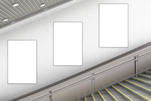blank advertising poster on underground escalator wall - stairs subway imagens e fotografias de stock