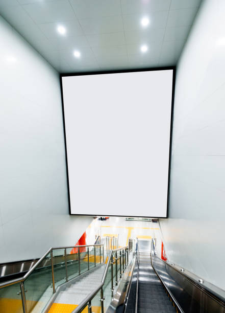 blank billboard above the escalator - stairs subway imagens e fotografias de stock