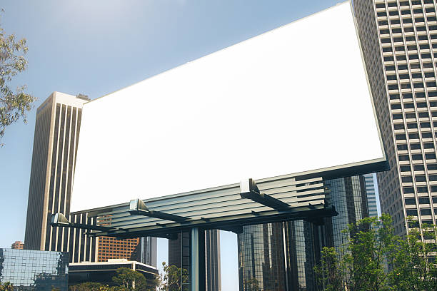 Blank billboard at skyscrapers backgound, mock up Blank billboard at skyscrapers backgound, mock up billboard posting stock pictures, royalty-free photos & images