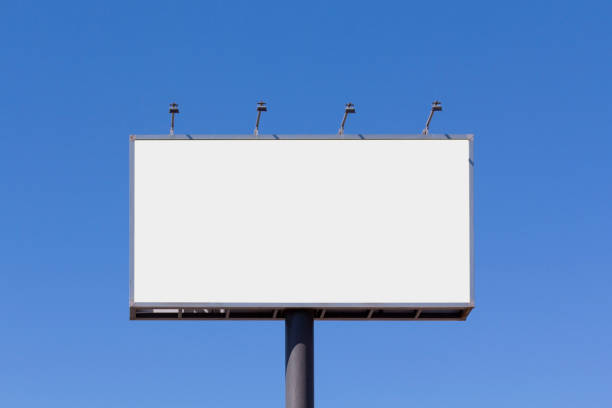 Blank billboard mock up Blank billboard mock up for advertising, against blue sky billboard stock pictures, royalty-free photos & images