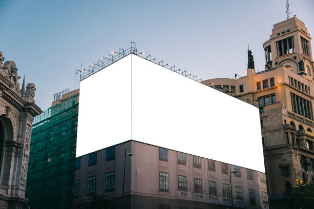 Blank billboard on building A blank billboard on a building. billboard posting stock pictures, royalty-free photos & images