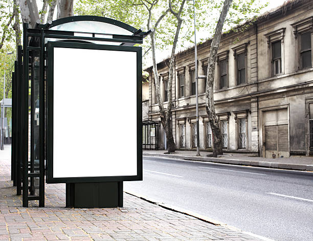Blank Billboard XXL Blank billboard on a bus stop-clipping path of billboard included billboard posting stock pictures, royalty-free photos & images