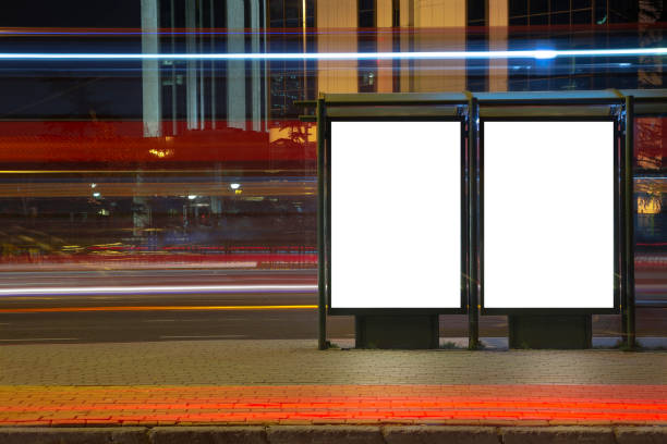 Blank binary billboard in night traffic stock photo