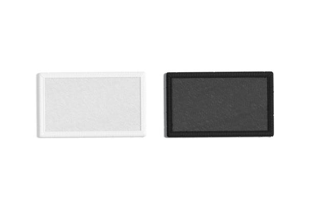Blank black and white rectangle embroidered patch mockup, top view stock photo