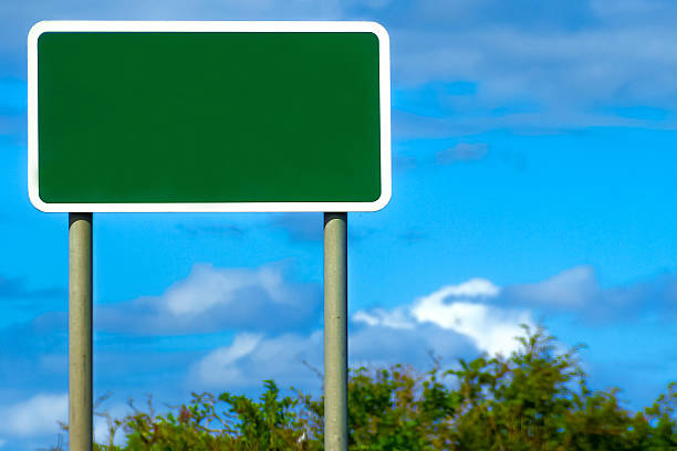 Blank British Road Sign A motorway sign in England, blank for your own text to be inserted. multiple lane highway photos stock pictures, royalty-free photos & images
