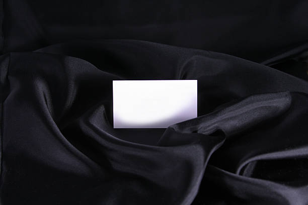Blank Card on Black Satin stock photo