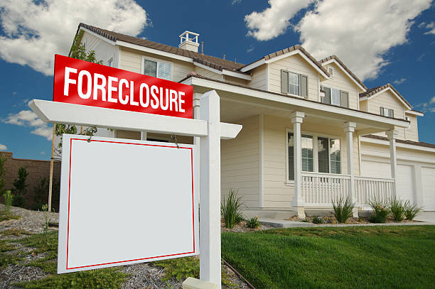 Blank Foreclosure Sign in Front of House  foreclosure stock pictures, royalty-free photos & images