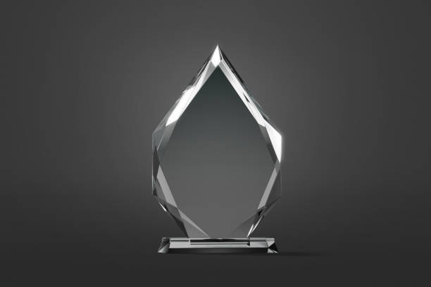 Blank glass arrow shape award mock up, dark background stock photo