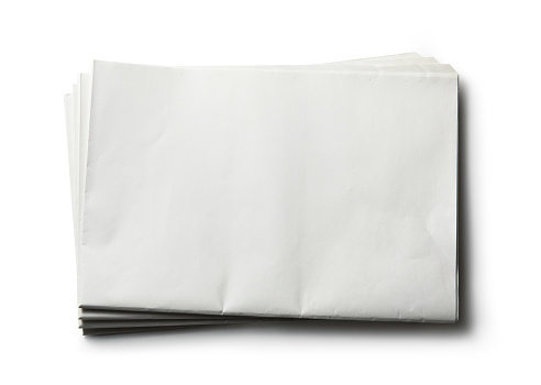 Blank newspaper on white background.