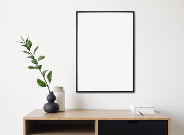 Blank picture frame on a wall. Artwork mock-up in interior design stock photo