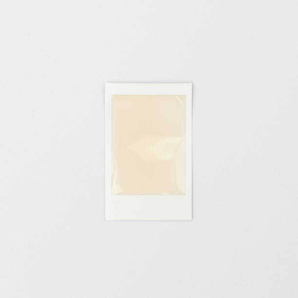 blank polaroid photo frame isolated on white background front view of blank polaroid photo frame isolated on white background obsolete photos stock pictures, royalty-free photos & images