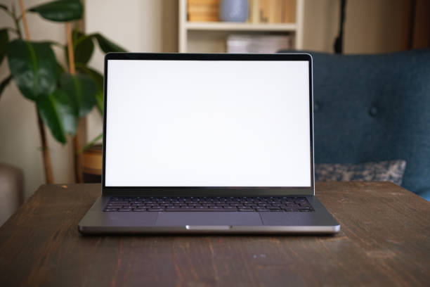 Blank screen modern laptop on table stock photo