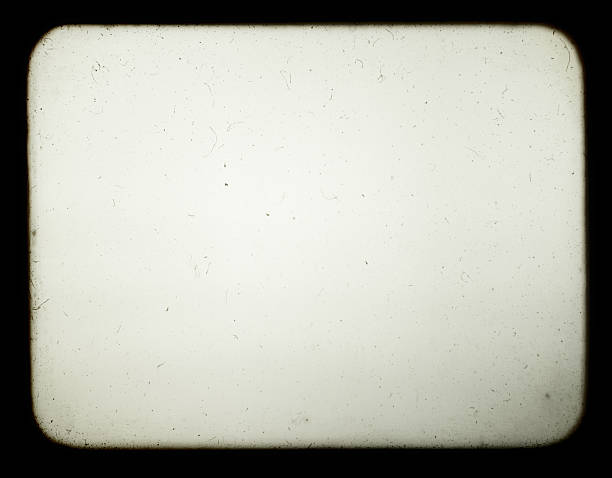 Blank screen of old slide projector. Snapshot of a blank screen of old slide projector, suited to achieve the effect of old photos. device screen photos stock pictures, royalty-free photos & images