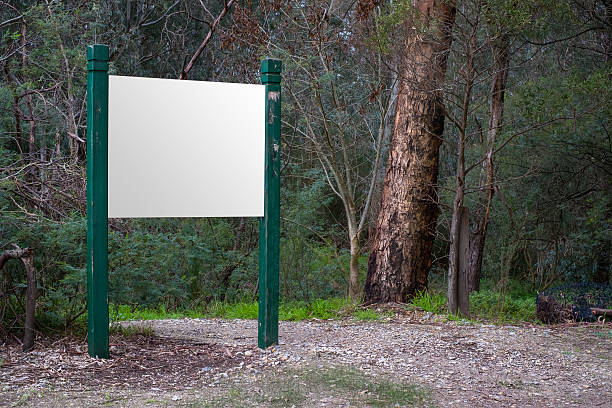 Blank sign along a hiking trail stock photo
