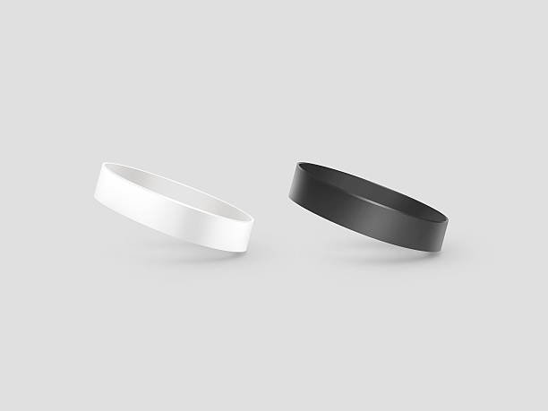 Blank white and black rubber wristband mockup, clipping path, Blank white and black rubber wristband mockup, clipping path, 3d illustration. Clear sweat band mock up design. Sport sweatband template. Silicone fashion round social bracelet. Unity band. wristband stock pictures, royalty-free photos & images