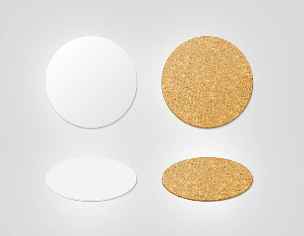 Blank white and cork textured beer coasters mockup, clipping path Blank white and cork textured beer coasters mockup, clipping path, 3d illustration. Round clear mug mat design mock up top view. Circle cup rug display, 2 side set, isolated. Bottle plain coaster coaster stock pictures, royalty-free photos & images