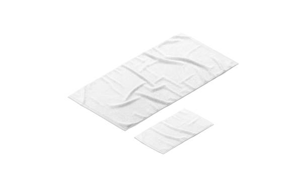 Blank white crumpled big and small towel mockup, side view stock photo