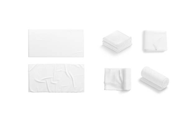 Blank white folded and unfolded towel mockup, different views stock photo