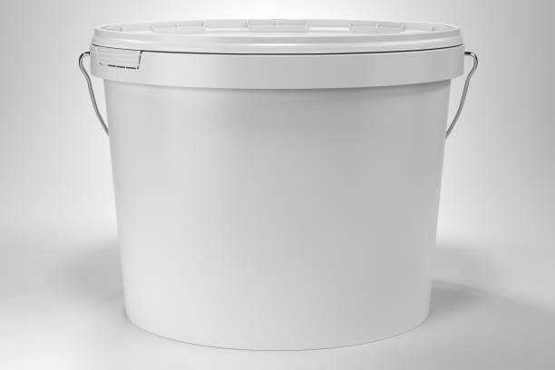 Blank white paint bucket with handle and lid on white neutral background front view stock photo