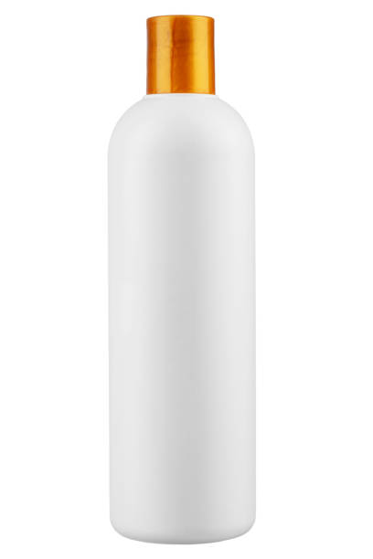 Blank white plastic cosmetics or shampoo bottle isolated on white background. stock photo