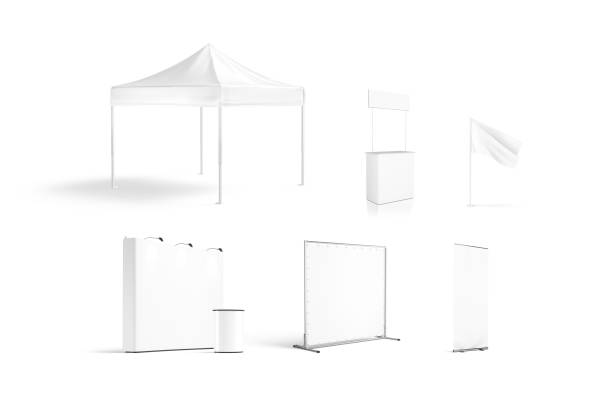 Blank white promotion trade stand mockup set isolated Blank white promotion trade stand mockup set isolated, 3d rendering. Empty booth and tent for company exposition mock up. Clear promo counter, flag and roll-up for logotype mokcup template. canopy stock pictures, royalty-free photos & images