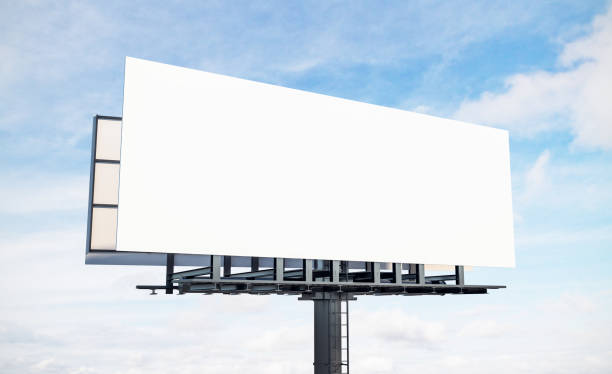 Blank white sky billboard Blank white billboard on blue sky and clouds background. Commercial and ad concept. Mock up, 3D Rendering billboard stock pictures, royalty-free photos & images