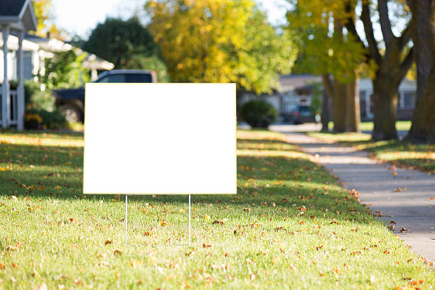 blank yard sign with copy space during fall white sign with clipping path on front lawn during sunny day. garden stock pictures, royalty-free photos & images