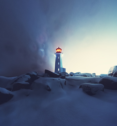 A blizzard envelopes Peggy's Cove Lighthouse.