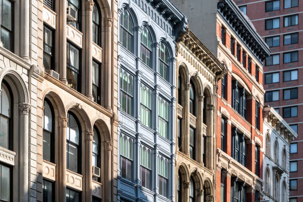 Block of historic old buildings on Broadway in Lower Manhattan, New York City stock photo