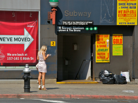Blond Woman With Tablet Computer Near Subway Entrance Nyc Stock Photo - Download Image Now - iStock