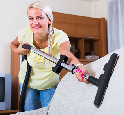 Blonde Girl Hoovering In Living Room Stock Photo - Download Image Now ...