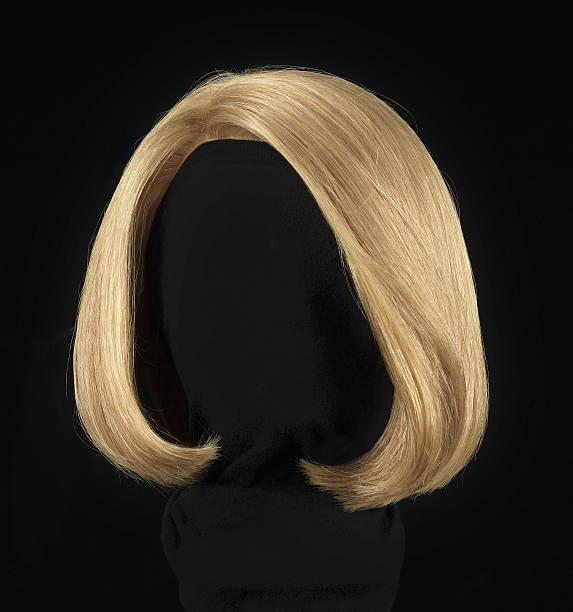 blonde wig female blonde wig on a black background wig stock pictures, royalty-free photos & images