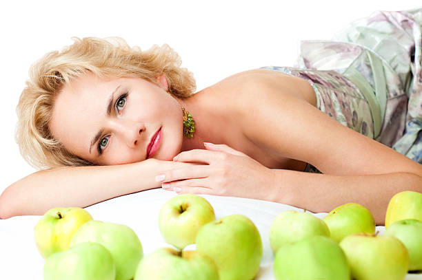 blonde with apples stock photo