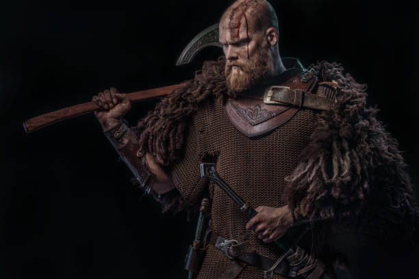 Bloody Viking warrior in studio shot stock photo